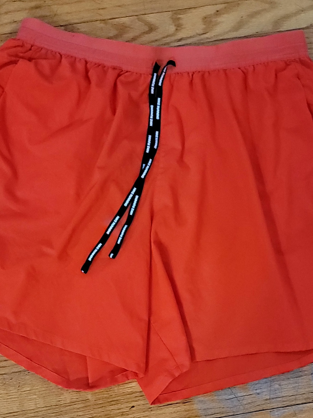 Nike Men's Coral-Red Athletic Shorts with Black Drawstring